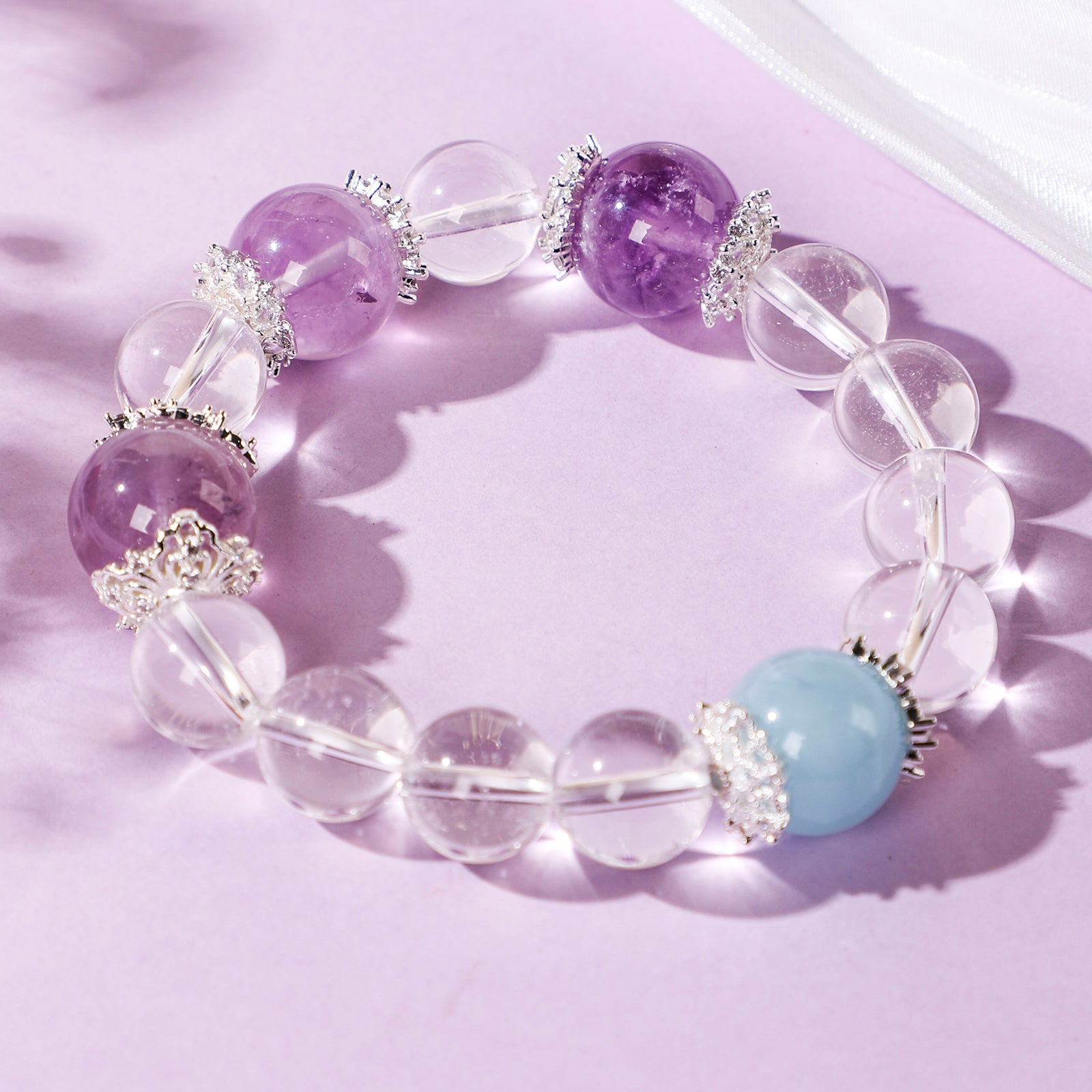 Bracelet with Three Purple Beads and One Blue Bead